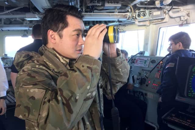 Alan Mak MP looks out from HMS Monmouth