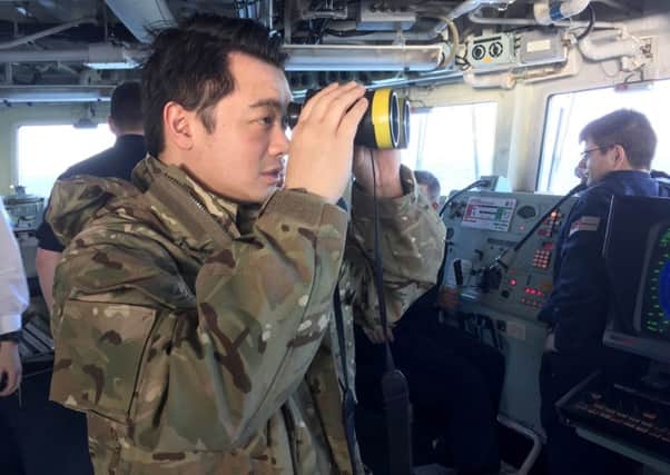 Alan Mak MP looks out from HMS Monmouth