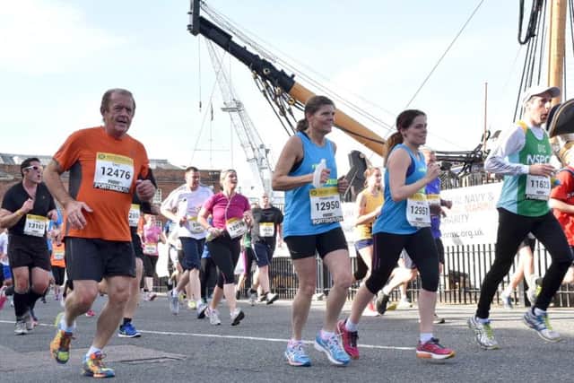 Eric Pollard, in orange, who has started running after a 20-year gap, having undergone a procedure on his back