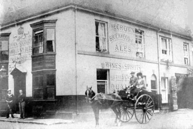 ENTENTE CORDIALE The Crown Inn probably taken in 1905 when the French fleet visited Portsmouth as it shows a French matelot at the door, standing alongside the innkeeper.