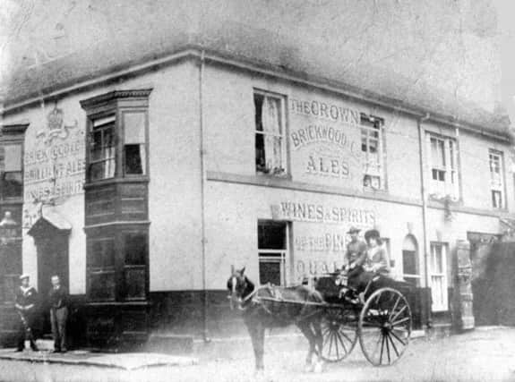 ENTENTE CORDIALE The Crown Inn probably taken in 1905 when the French fleet visited Portsmouth as it shows a French matelot at the door, standing alongside the innkeeper.