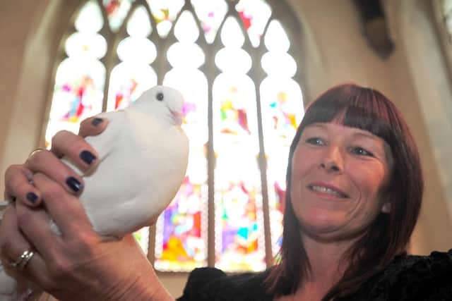 Wedding fair at St John's church, Stanground. Pictured with a white dove on show from  from The White Dove Loft is bride to be  Dawn Abbott. ENGEMN00120121013130249