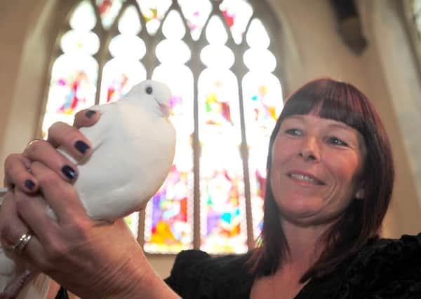 Wedding fair at St John's church, Stanground. Pictured with a white dove on show from  from The White Dove Loft is bride to be  Dawn Abbott. ENGEMN00120121013130249