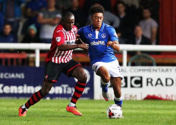Brandon Joseph-Buadi, right, making his Pompey debut at Exeter in the Johnstone's Paint Trophy   Picture: Joe Pepler
