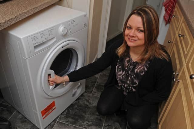 Nicky Holland from Old Portsmouth with her old tumble dryer
