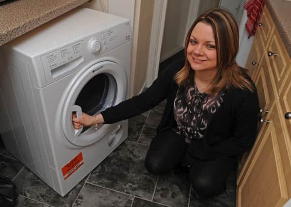 Nicky Holland from Old Portsmouth with her old tumble dryer