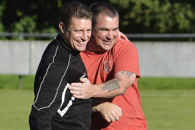Petersfield Town boss Ian Saunders, right     Picture: Neil Marshall