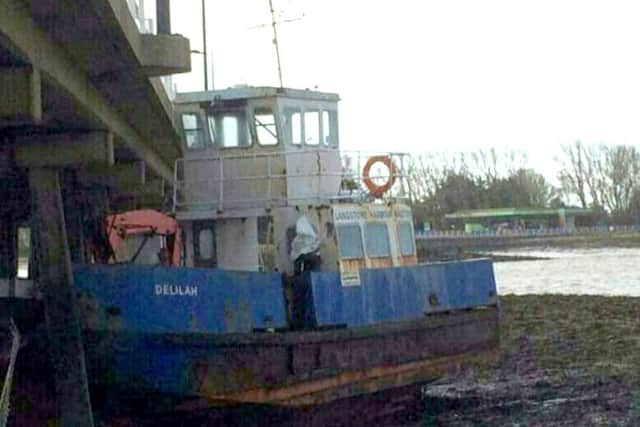 Delilah, which has beached itself next to Langstone Bridge after Storm Katie