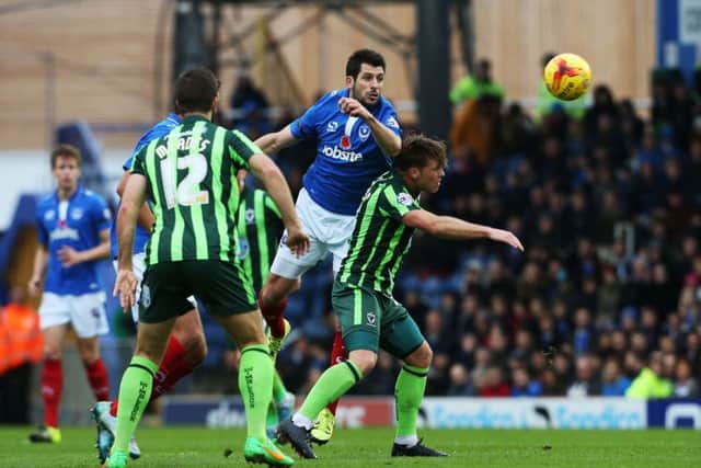 Action from Pompey's scrappy draw with AFC Wimbledon in November. Picture: Joe Pepler