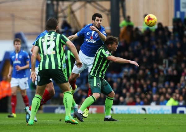 Action from Pompey's scrappy draw with AFC Wimbledon in November. Picture: Joe Pepler