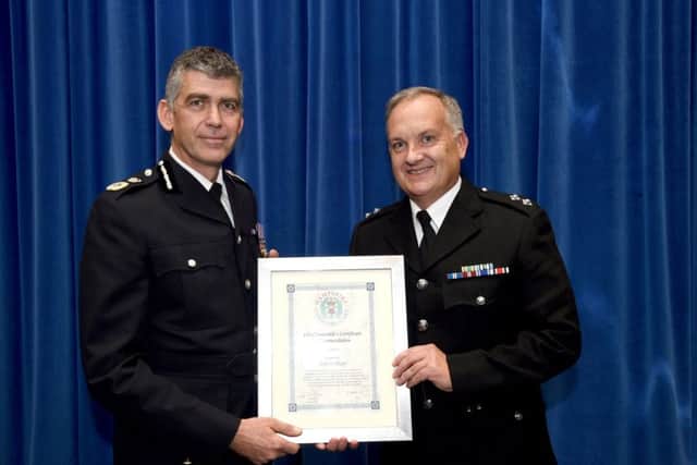 Hampshire's former chief constable Andy Marsh with Inspector Kelvin Shipp
