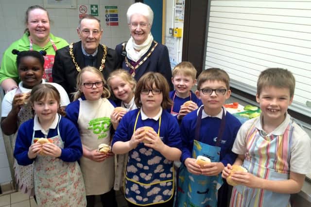 FREE LESSONS Fikile Nyathi, Jasmin Burke, Amy Laver , Abigail Webber, Finlay Underhill, James Lear, Oliver Doughty and Ephraim Royle with the Mayor and Mayoress of Gosport Cllr Keith Farr and June Farr and Rachel Webber, community champion at Asda