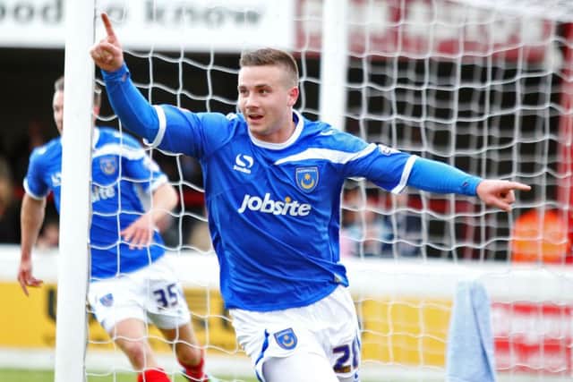 Michael Drennan celebrates a goal in Pompey's first visit to Dagenham & Redbridge. Picture: Joe Pepler