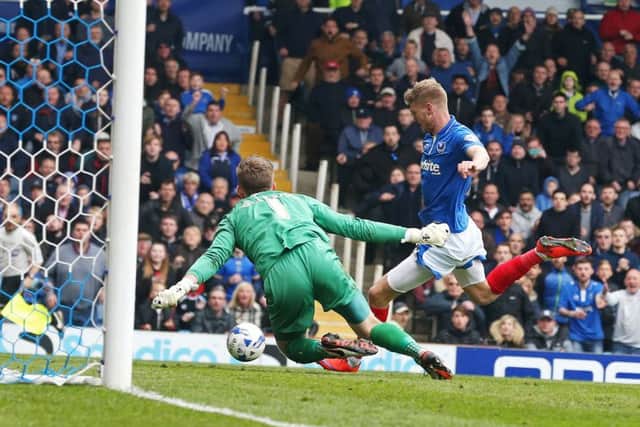 Michael Smith opens the scoring for Pompey Picture: Joe Pepler