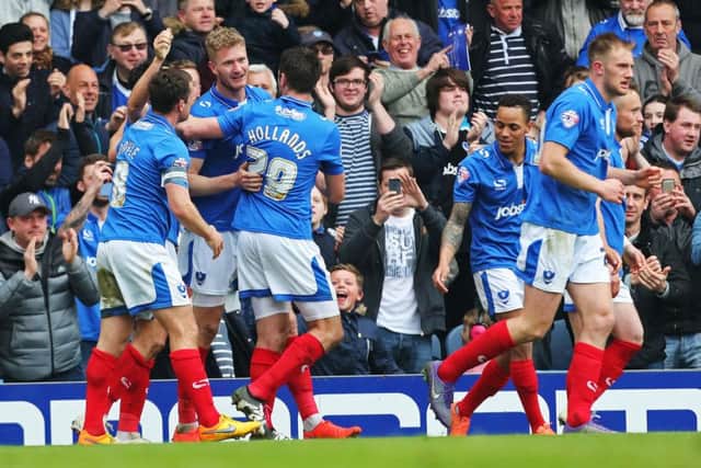 Pompey celebrate Michael Smith's winner Picture: Joe Pepler