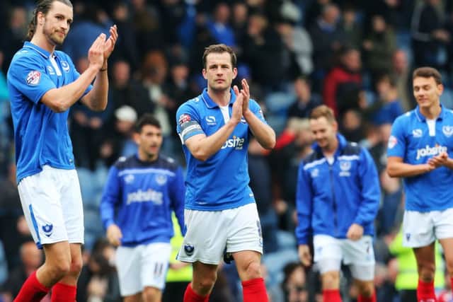 The Pompey players applaud the fans at the final whistle Picture: Joe Pepler