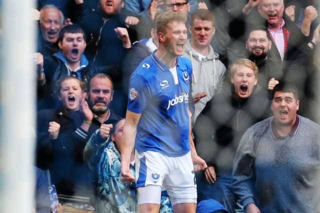 Michael Smith celebrates his winner Picture: Joe Pepler