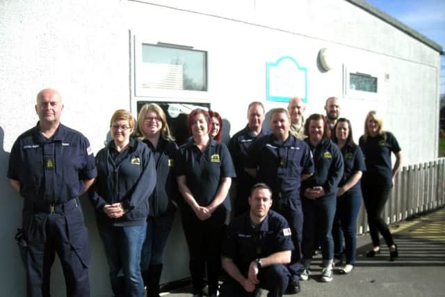 Members of Steady Steps Pre-School and Nursery staff with the volunteers