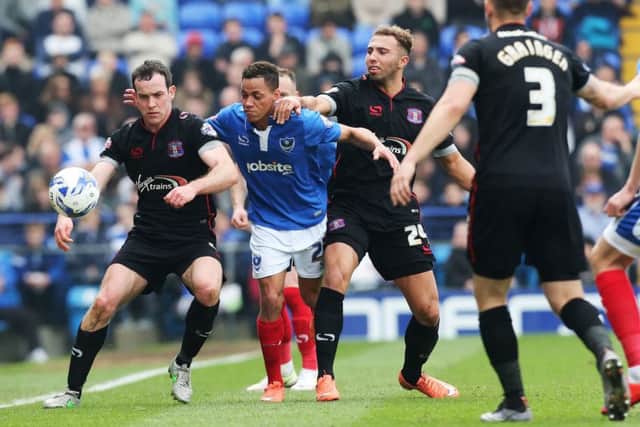 Kyle Bennett puts pressure on Carlisle Picture: Joe Pepler