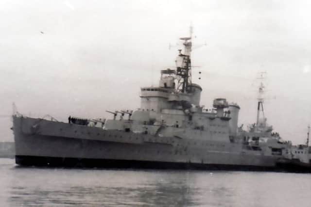 HMS Sheffield the Shiny Sheff makes her way down Fareham Creek on her final voyage. Picture: Mike Cooper.