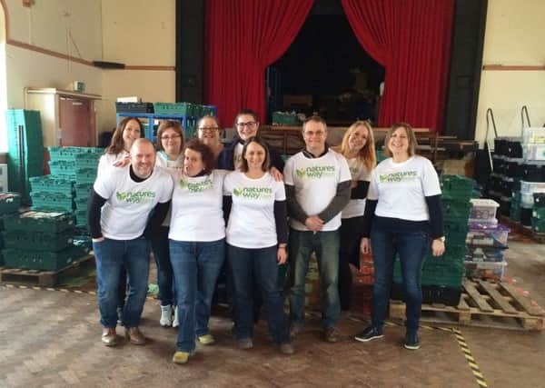 Natures Way Foods team get hands on at Portsmouth Foodbank