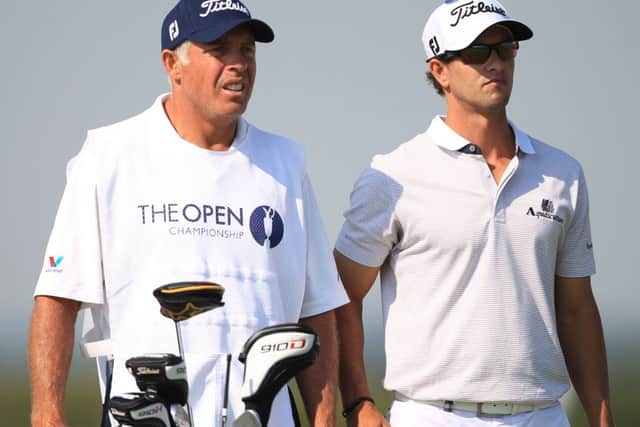 Australia's Adam Scott, right, with caddie Steve Williams