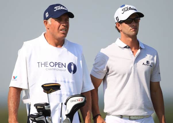 Australia's Adam Scott, right, with caddie Steve Williams