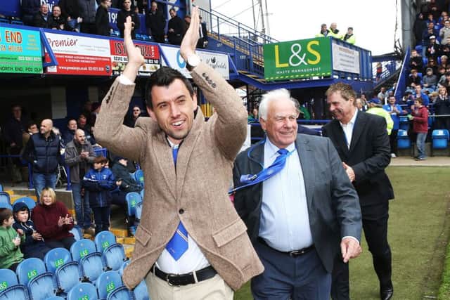 Svetoslav Todorov is welcomed onto the pitch at Fratton Park on Saturday