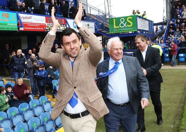 Svetoslav Todorov is welcomed onto the pitch at Fratton Park on Saturday