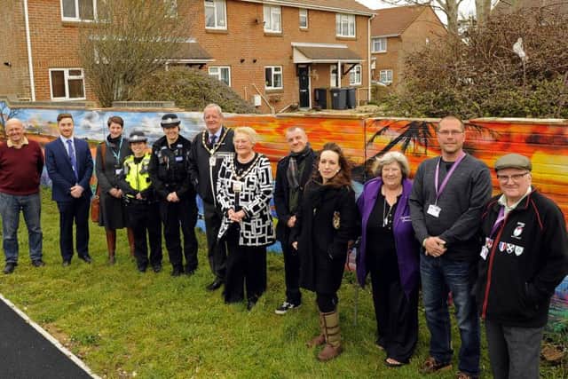 Members of Play Parks For Hayling in front of the new mural
Picture: Malcolm Wells (160406-2523)