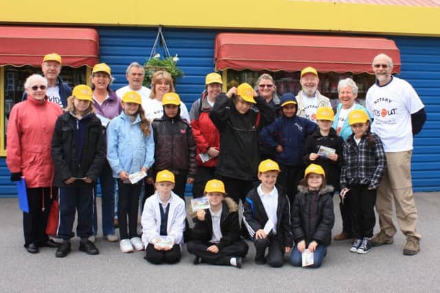 Rotarians and students at Paultons Park