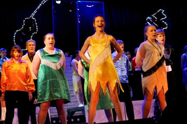 Centre, Gosport Scout Ellie Searle during the Gang Show performance.Picture: Sarah Standing (160601-897)