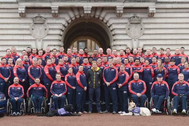 Prince Harry, centre, at Buckingham Palace in London at the unveiling of the UK team for the Invictus games 2016