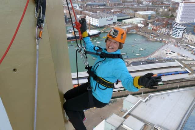 RAISING AWARENESS Corinne Rowbotham abseiled down the Spinnaker Tower