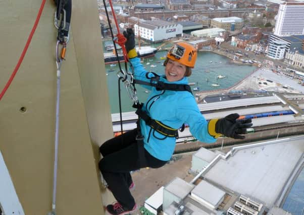 RAISING AWARENESS Corinne Rowbotham abseiled down the Spinnaker Tower