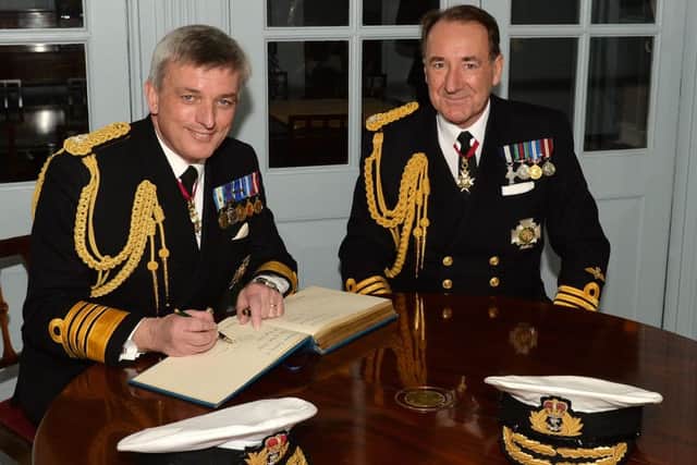 Admiral Sir George Zambellas, right, and new Royal Navy leader Admiral Sir Philip Jones