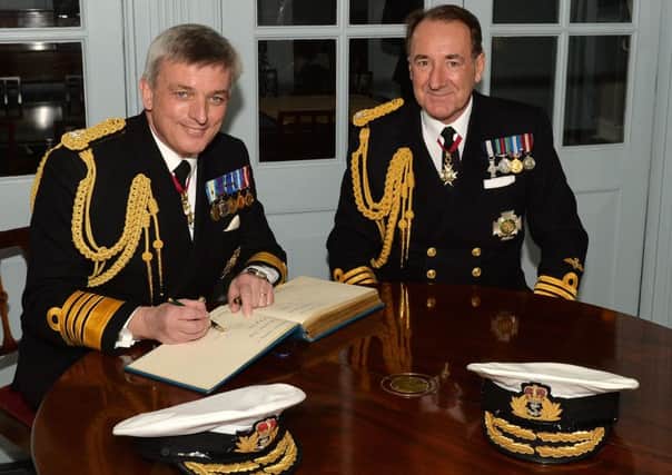 Admiral Sir George Zambellas, right, and new Royal Navy leader Admiral Sir Philip Jones