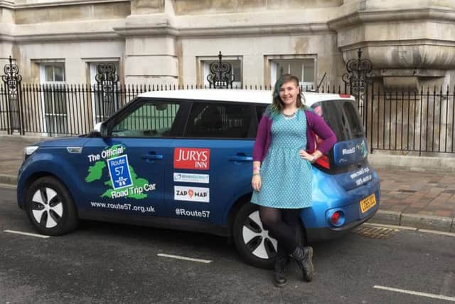 Jess Shanahan with the Route 57 car outside Portsmouth Guildhall
