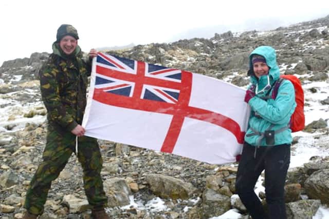 Kirsty Taylor and her friend Christian Dobson on their charity challenge in Scotland for Marie Curie Cancer