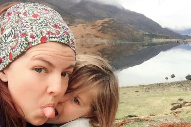 Kirsty Taylor and her daughter Molly, six, on their charity challenge in Scotland for Marie Curie Cancer