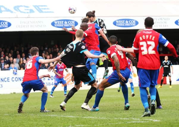 Christian Burgess heads Pompey in front Picture: Joe Pepler