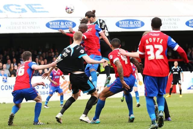 Christian Burgess scores Pompey's decisive second goal Picture: Joe Pepler