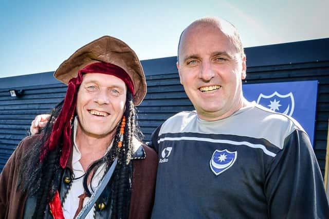 Craig Bryden, the Pompey Pirate at the Pompey training ground with manager Paul Cook Picture: Colin Farmery