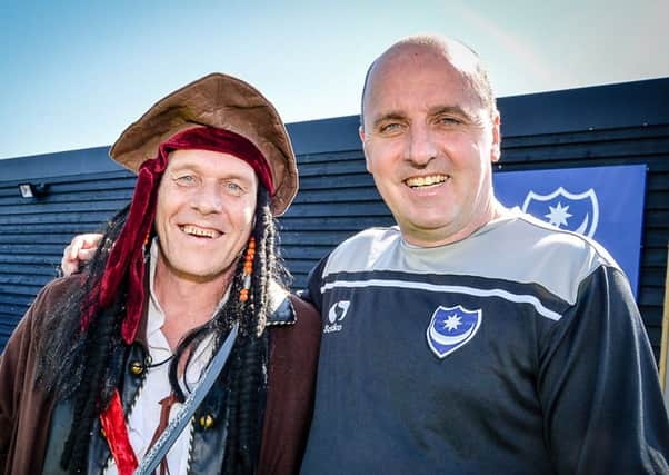 Craig Bryden, the Pompey Pirate at the Pompey training ground with manager Paul Cook 

Picture: Colin Farmery