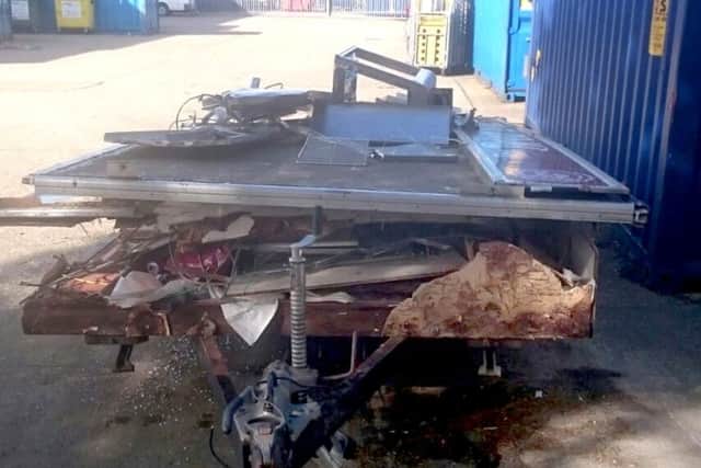 The trailer after the crash on the M3