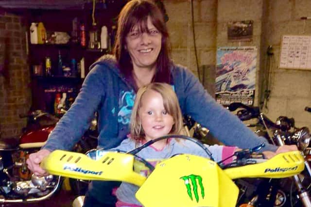 Julie Corben with her grandaughter Maisie in 2013