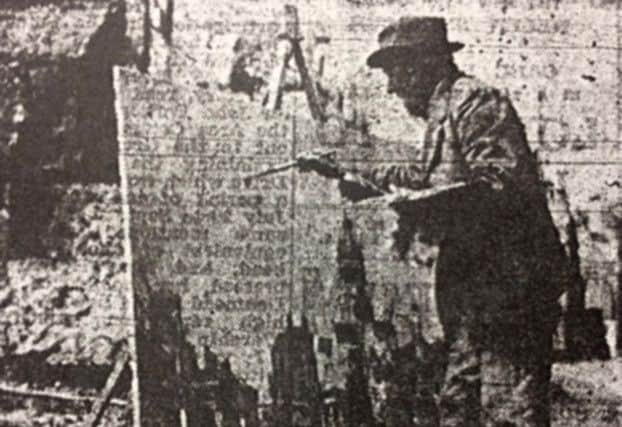 Edward King painting A photograph published in The Evening News on July 22, 1942, with a caption which read: Mr. Edward King painting bomb damage in a Portsmouth Street.