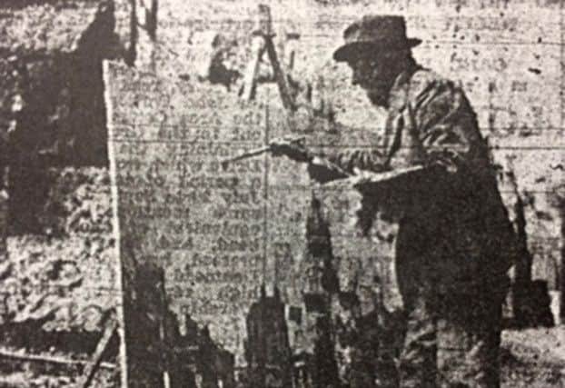 Edward King painting 

A photograph published in The Evening News on July 22, 1942, with a 
caption which read: Mr. Edward King painting bomb damage in a Portsmouth Street.