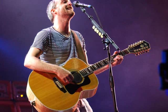 Fran Healy of Travis performing on the main stage at the Isle of Wight Festival in 2005