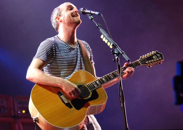 Fran Healy of Travis performing on the main stage at the Isle of Wight Festival in 2005